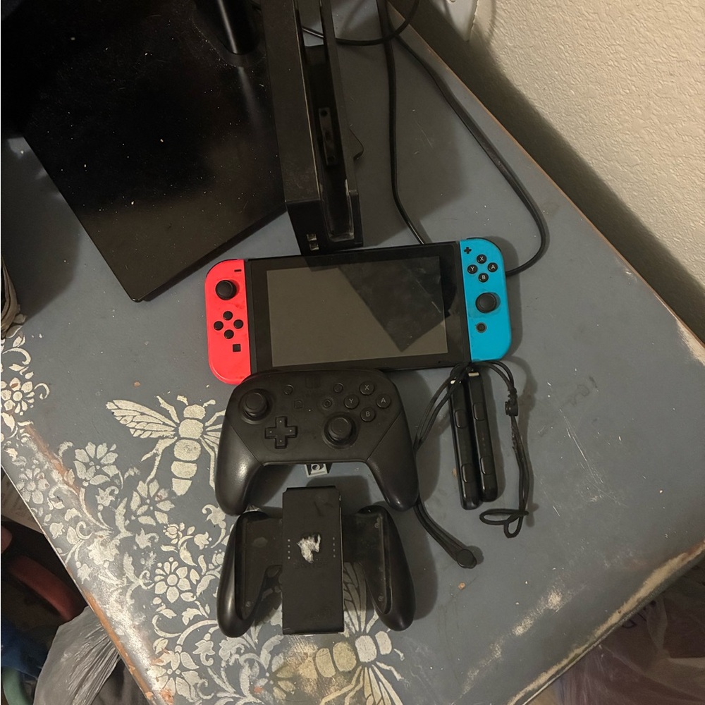 Nintendo Switch Console with Neon Red and Blue Joy-Con
